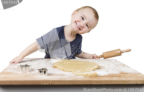 Image of child making cookies