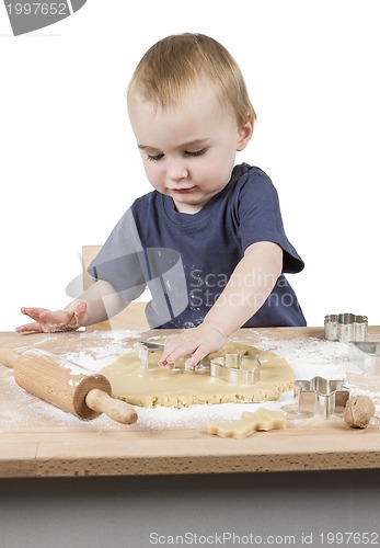 Image of child making cookies