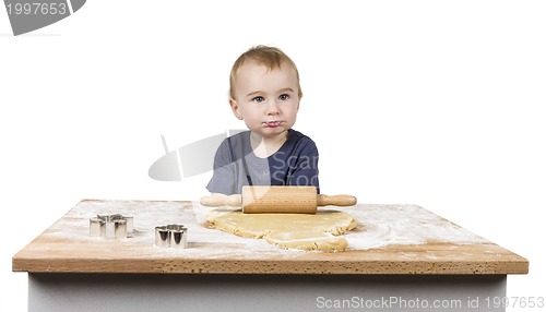 Image of child making cookies