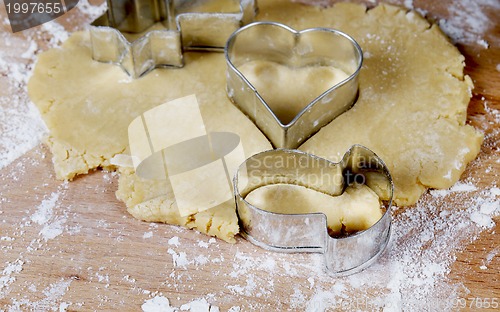 Image of making cookies on wooden desk