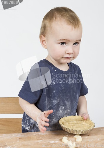 Image of child making cookies