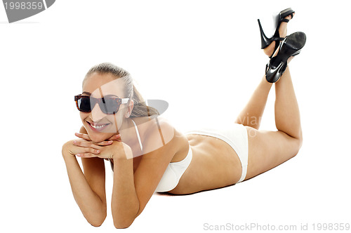 Image of Attractive young model wearing bikini and goggles