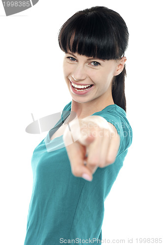 Image of Casual middle aged woman pointing at the camera