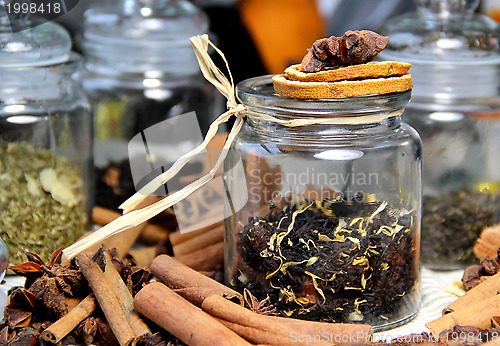 Image of Cinnamon sticks and dry orange