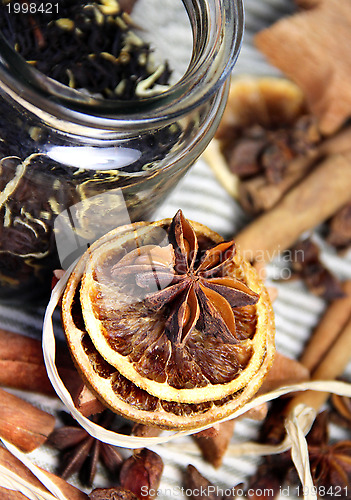 Image of Cinnamon sticks and dry orange