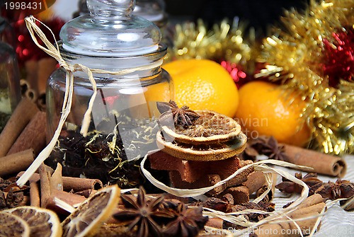 Image of Cinnamon sticks and dry orange