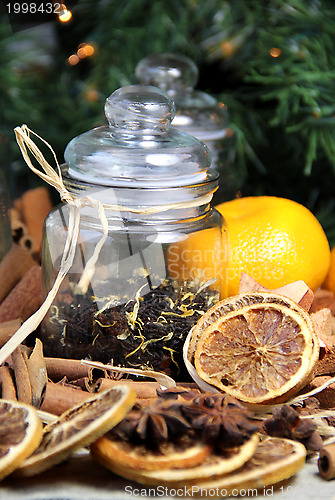 Image of Cinnamon sticks and dry orange