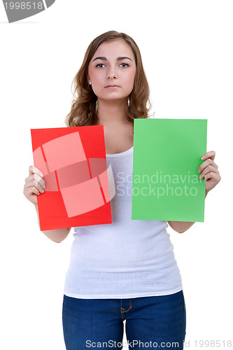 Image of Young beautiful girl chooses a different color