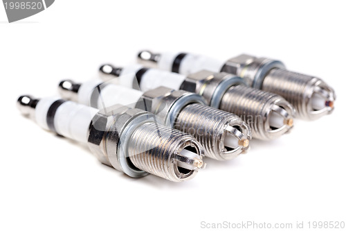 Image of Four new spark plugs