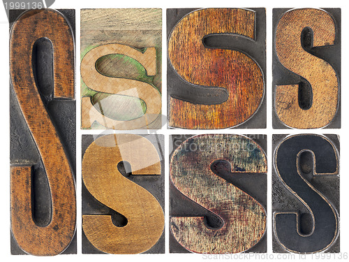 Image of letter S in wood type blocks