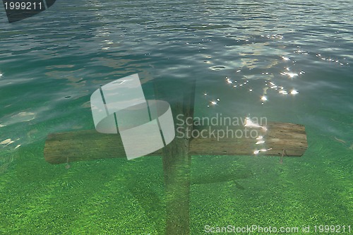 Image of Wooden cross under water