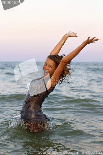 Image of Happy wet teen girl