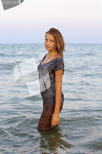 Image of nice girl in wet clothes