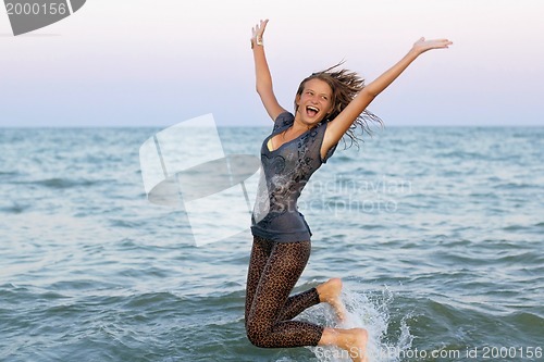 Image of Cheerful wet teen girl