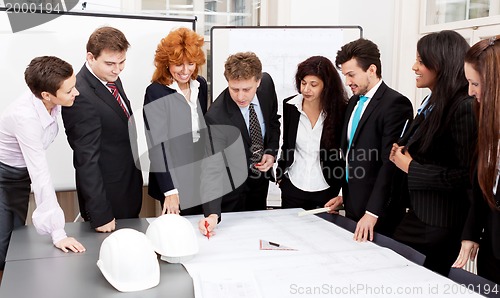 Image of business team looking architecture project 
