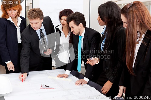 Image of business team looking architecture project 
