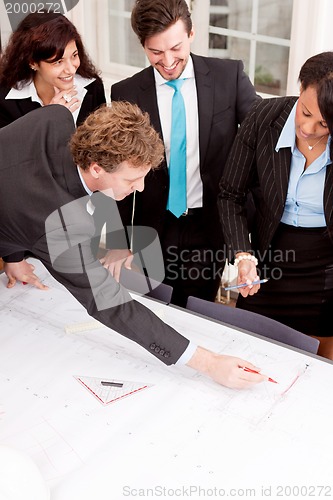 Image of business team looking architecture project 