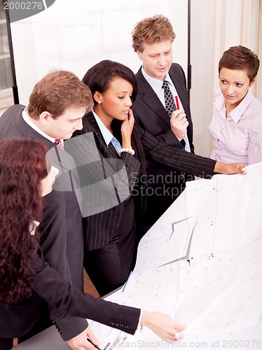 Image of business team looking architecture project 