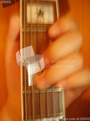 Image of Playing guitar