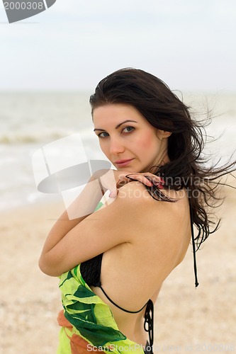 Image of sexy young woman on the beach