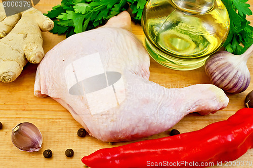 Image of Chicken leg with vegetables and oil