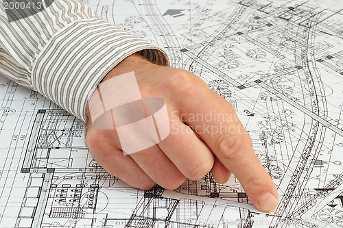 Image of architect pointing the solution