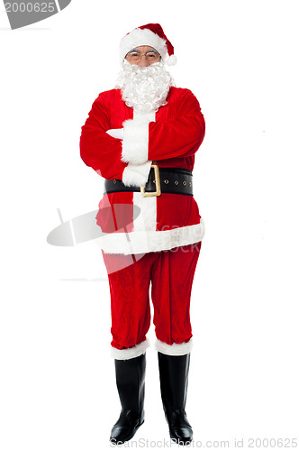 Image of Confident old man in Santa costume