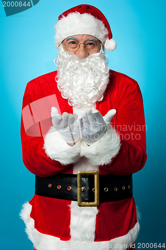 Image of Santa praying peace and happiness for all