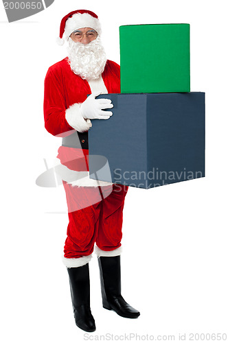 Image of Photo of happy Santa Claus delivering gifts