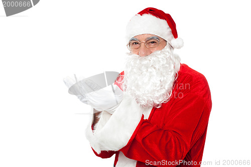 Image of Happy Santa Claus smiling with open palms