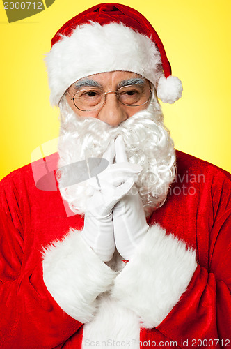 Image of Santa trying to recollect his old memories