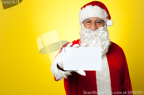 Image of Santa holding blank white placard