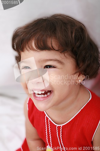 Image of beautiful little girl isolated on a white background 