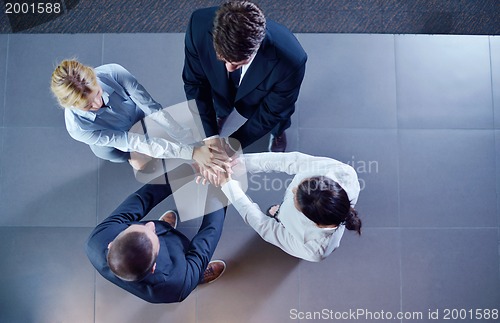 Image of business people group joining hands