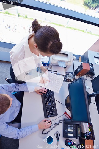 Image of business people in a meeting at office