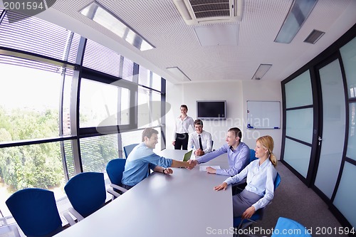 Image of business people in a meeting at office