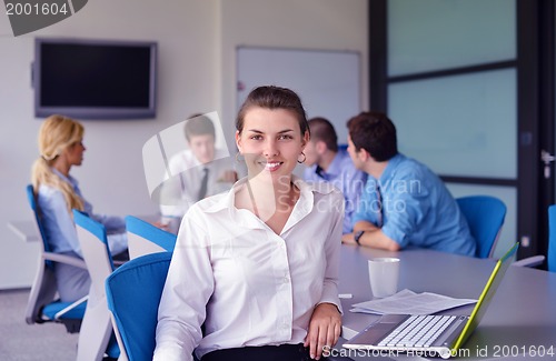 Image of business people in a meeting at office
