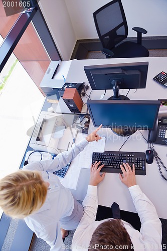 Image of business people in a meeting at office