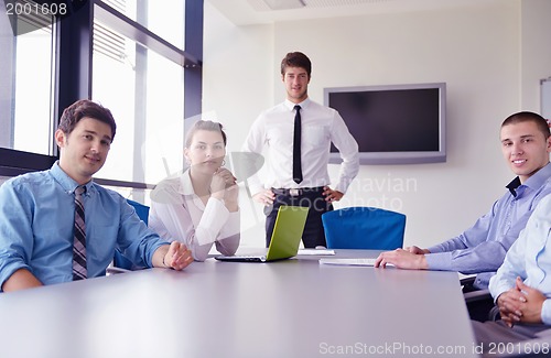 Image of business people in a meeting at office