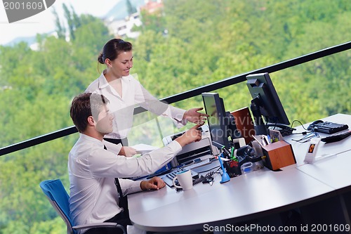 Image of business people in a meeting at office
