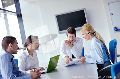 Image of business people in a meeting at office