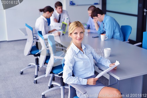 Image of business people in a meeting at office
