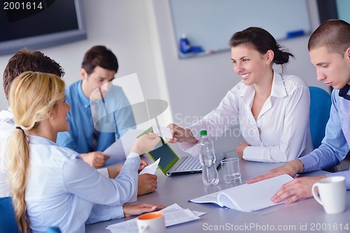 Image of business people in a meeting at office