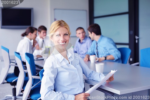 Image of business people in a meeting at office