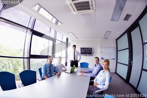 Image of business people in a meeting at office