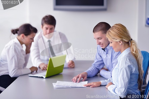 Image of business people in a meeting at office