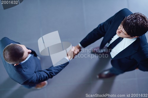 Image of business people making deal