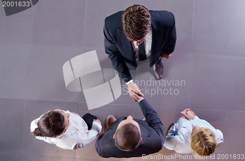 Image of business people making deal