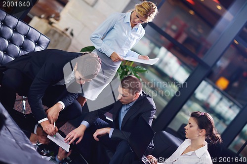 Image of business people in a meeting at office