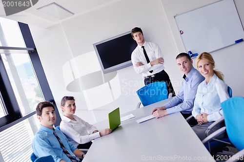 Image of business people in a meeting at office